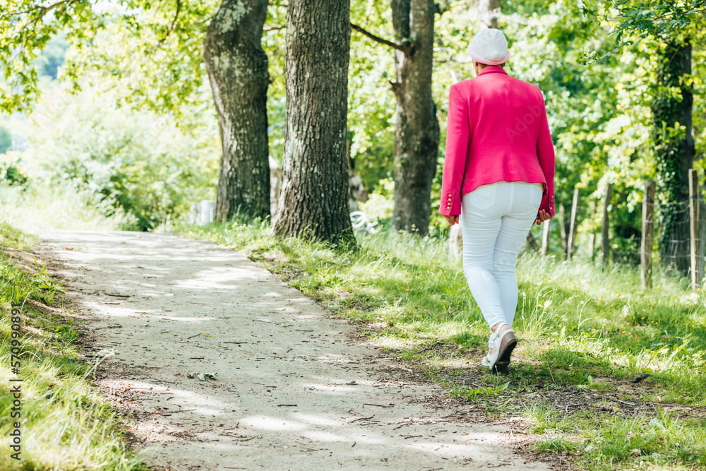 sick woman walks in nature sick woman walks in nature