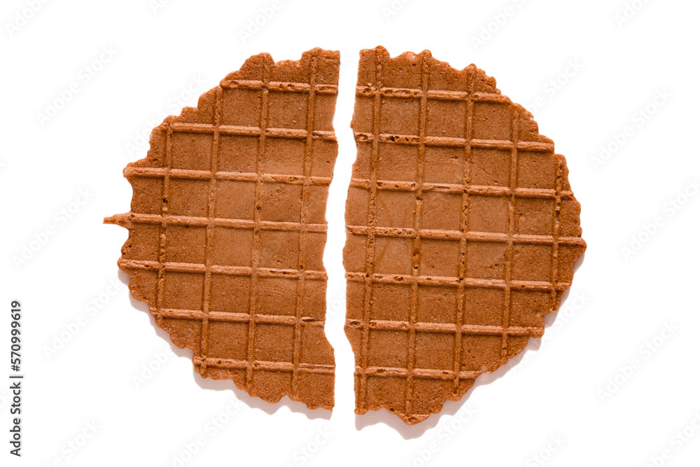 Wafers are round, broken in half, isolated. Thin waffle cookies, chocolate Belgian waffles, waffle breakfast on a white background Wafers are round, broken in half, isolated. Thin waffle cookies, chocolate Belgian waffles, waffle breakfast on a white background