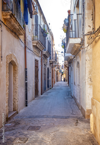 Typical Small street on the Island of Ortigia, Syracuse in Sicily, Italy.