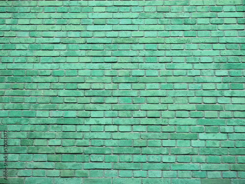 Emerald green brick wall texture. Grunge background.