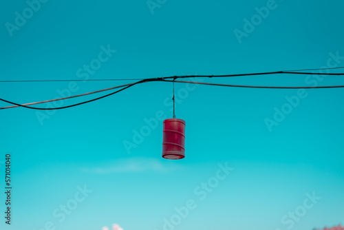 red lantern on blue sky background