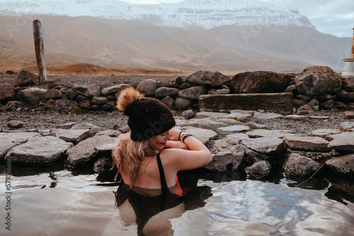 Wallpaper Mural Woman enjoying sunset at Hoffel Hot Tubs, Iceland Torontodigital.ca