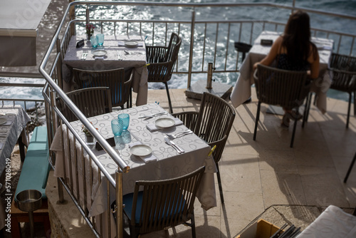 empty seaside restaurant table during summer