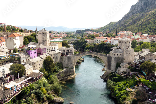 View of the old bridge in the city of Mostar and the river Neretva from above