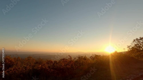 Timelapse of sun rising over mountains at an overlook in Ouachita National Forest, and fog clouds rising from the valleys in late fall
