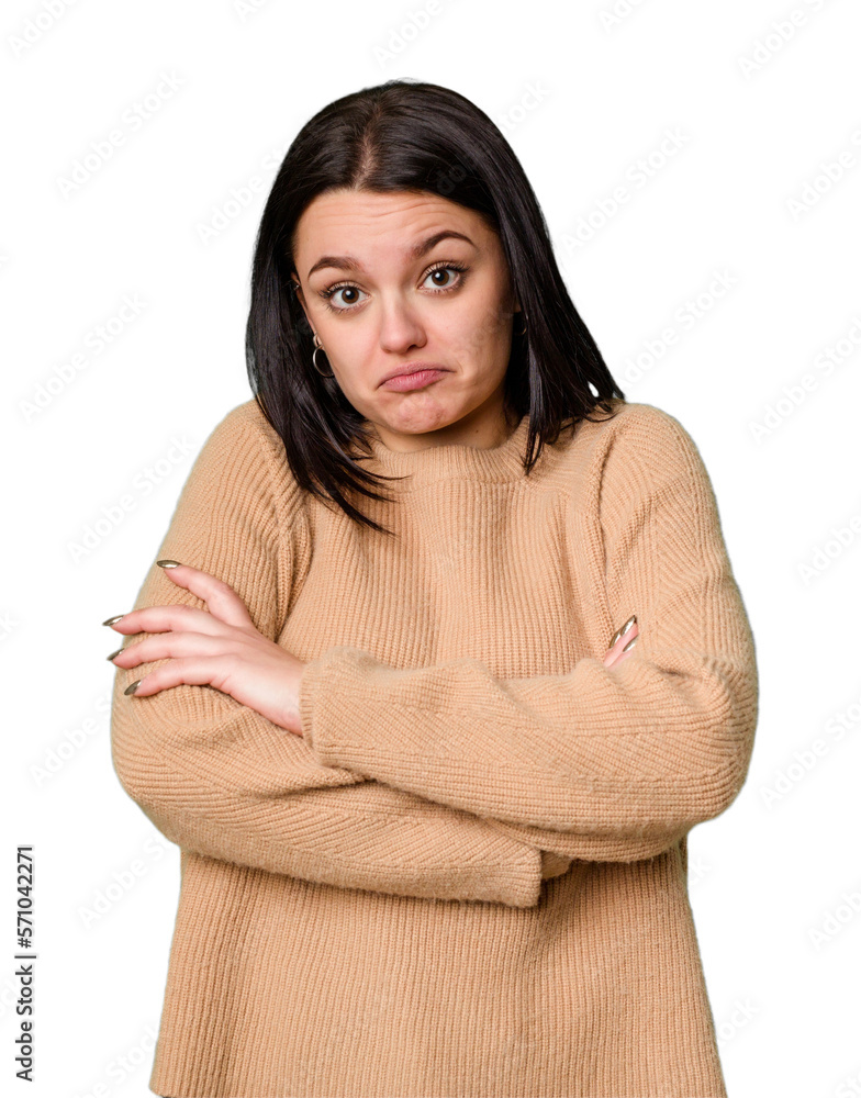 Young caucasian woman isolated shrugs shoulders and open eyes confused. Young caucasian woman isolated shrugs shoulders and open eyes confused.