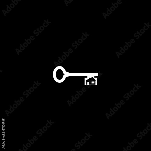 Old house key icon isolated on dark background © sljubisa