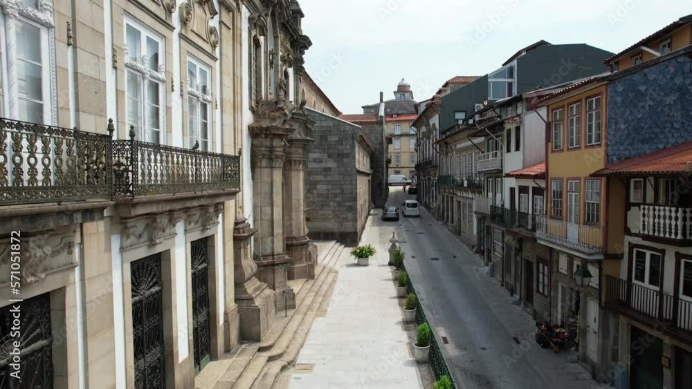 Authentic street in downtown of ancient city Guimaraes, North of Portugal. Classical Portuguese architecture Authentic street in downtown of ancient city Guimaraes, North of Portugal. Classical Portuguese architecture