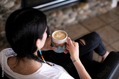 native woman drinking coffee