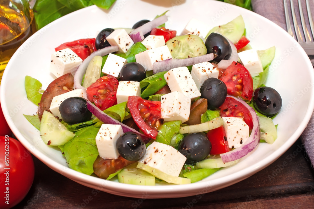 Greek salad with fresh vegetables closeup Greek salad with fresh vegetables closeup