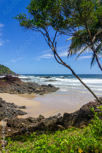 Sand, waves and rocks at Havaizinho beach
