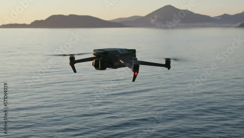 Montenegro, january 2023: drone with a camera dji mavic 3 fly over the sea at sunset