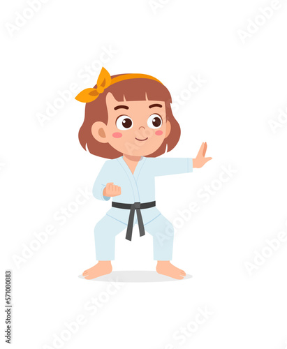 cute little kid training and showing karate pose