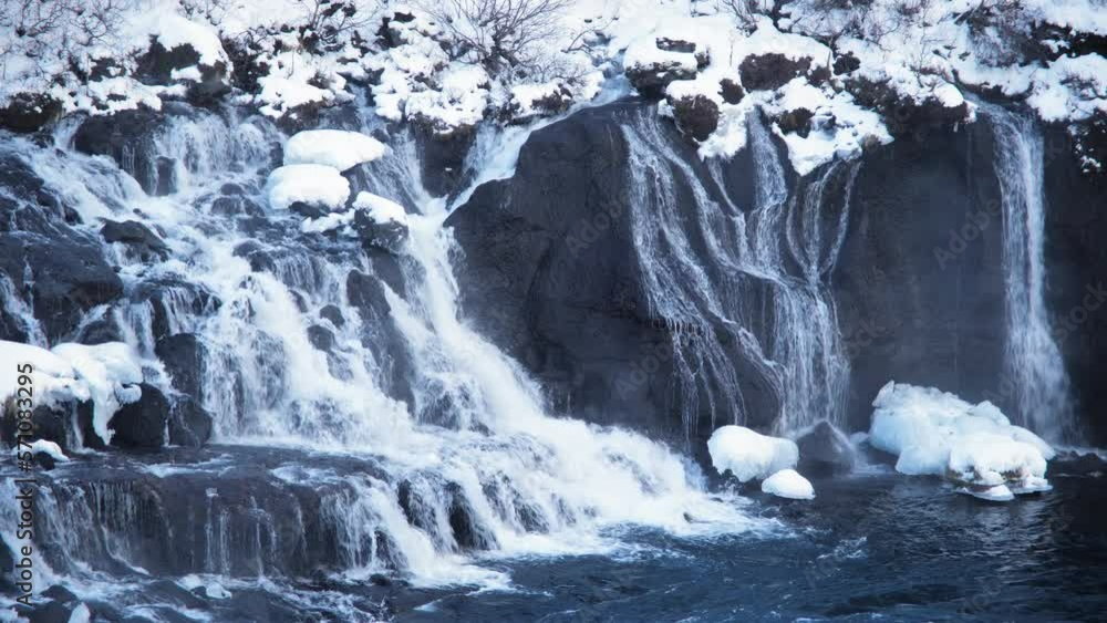 Waterfall Iceland snowy mountain cold river winter blue glacial water magical Waterfall Iceland snowy mountain cold river winter blue glacial water magical