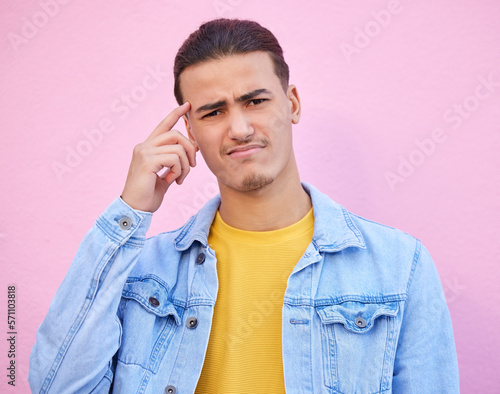 Confusion, portrait and man with casual outfit, doubt and wonder for future, thinking and mockup on studio background. Face, thoughtful male and gentleman with doubt, contemplation and unsure