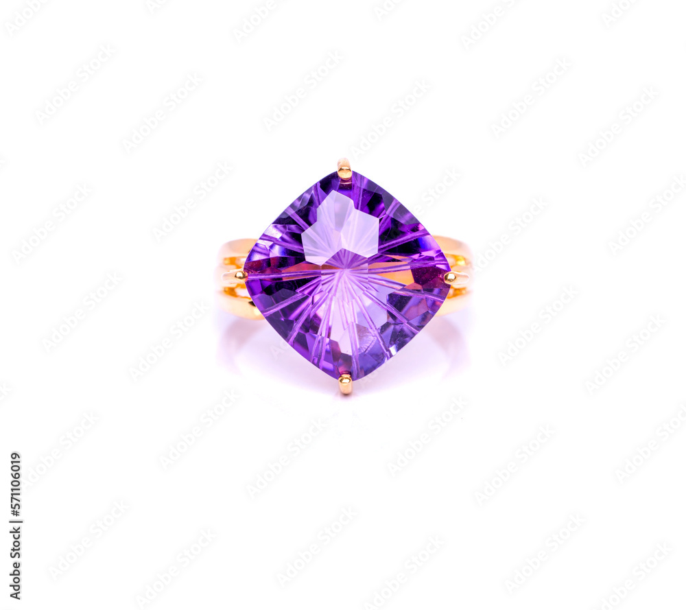 Amethyst Jewel or gems ring on white background with reflection. Collection of natural gemstones accessories. Studio shot Amethyst Jewel or gems ring on white background with reflection. Collection of natural gemstones accessories. Studio shot