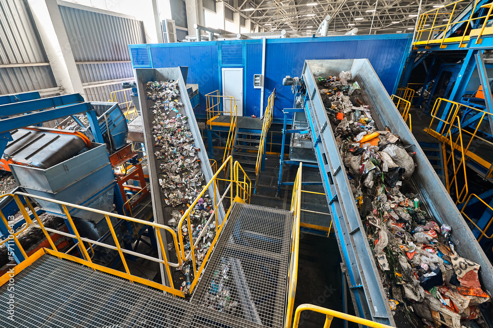 Conveyor belt transports sorted litter at recycling plant Stock