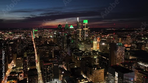 Aerial View of Center City Philadelphia at Night Lit Green for Philadelphia Eagles Superbowl
