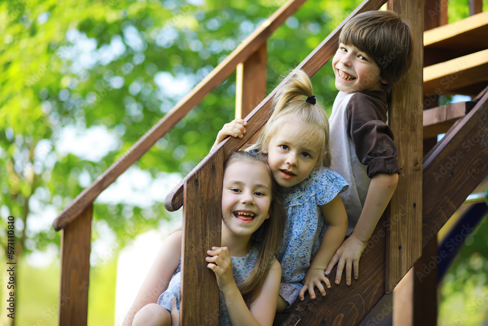 Obraz premium Children walk in the summer in nature. Child on a sunny spring morning in the park. Traveling with children.