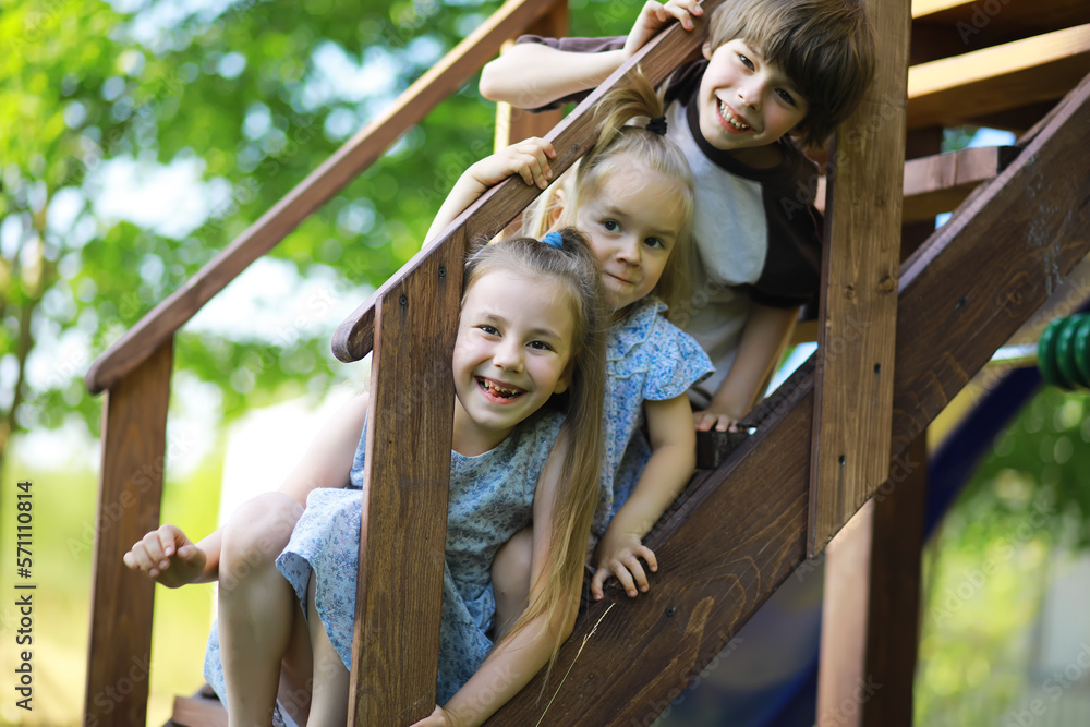 Obraz premium Children walk in the summer in nature. Child on a sunny spring morning in the park. Traveling with children.