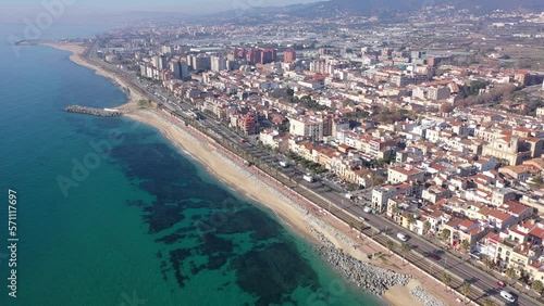 Aerial view of residential areas and the coast of the small Catalan town of Vilasar de Mar, Spain. photo