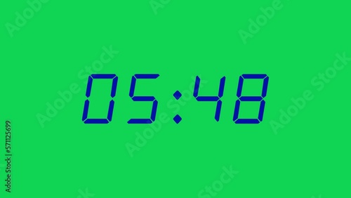 35 seconds digital clock count-up timer. Navy blue digits on Green Screen Chroma Key bg. Retro digital alarm clock concept photo