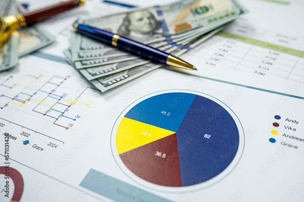 many business charts and graphs on office desk many business charts and graphs on office desk