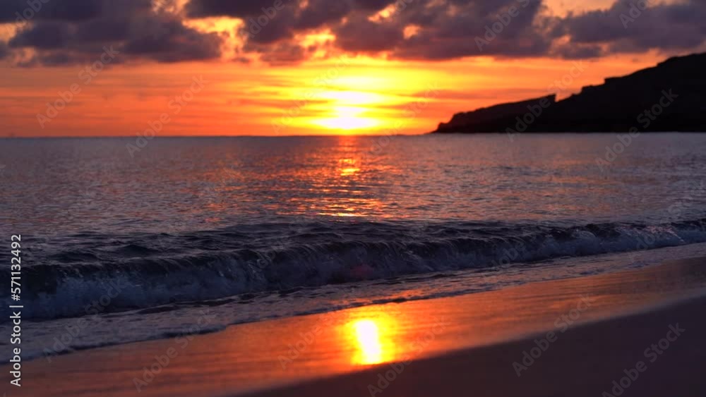 Waves coming in from the Mediterranean Sea onto the beach during sunrise. Waves coming in from the Mediterranean Sea onto the beach during sunrise.