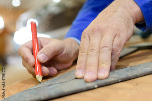 hand making a precise measurement © auremar