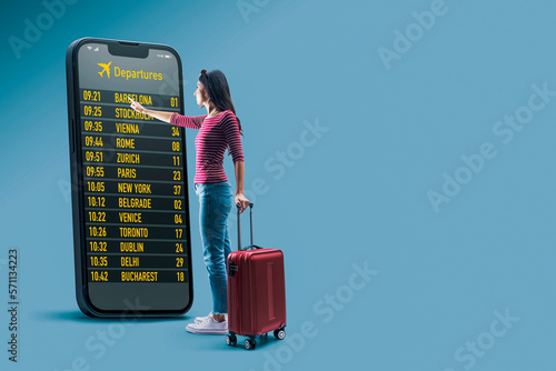 Traveler checking flight information online photo