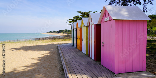 La Bree-les-Bains village wooden brightly coloured beach huts on West atlantic beach french oleron island photo