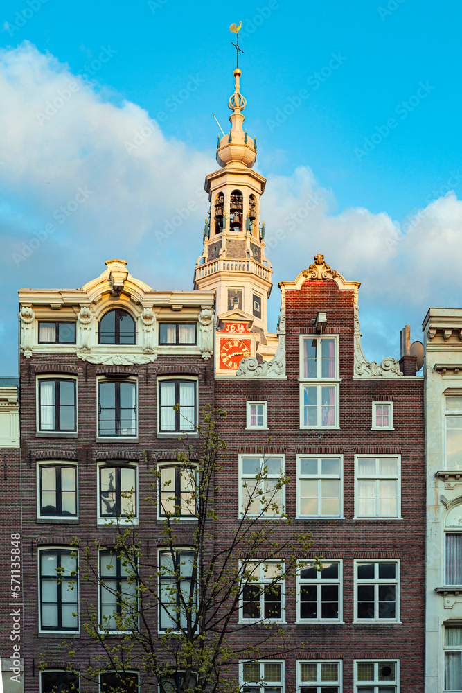 A Amsterdam street in spring with colorful houses in the style of classical Dutch architecture