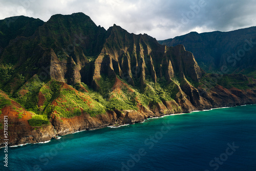 Scenery of the Na Pali Coast in Hawaii, with majestic mountains and turquoise waters photo