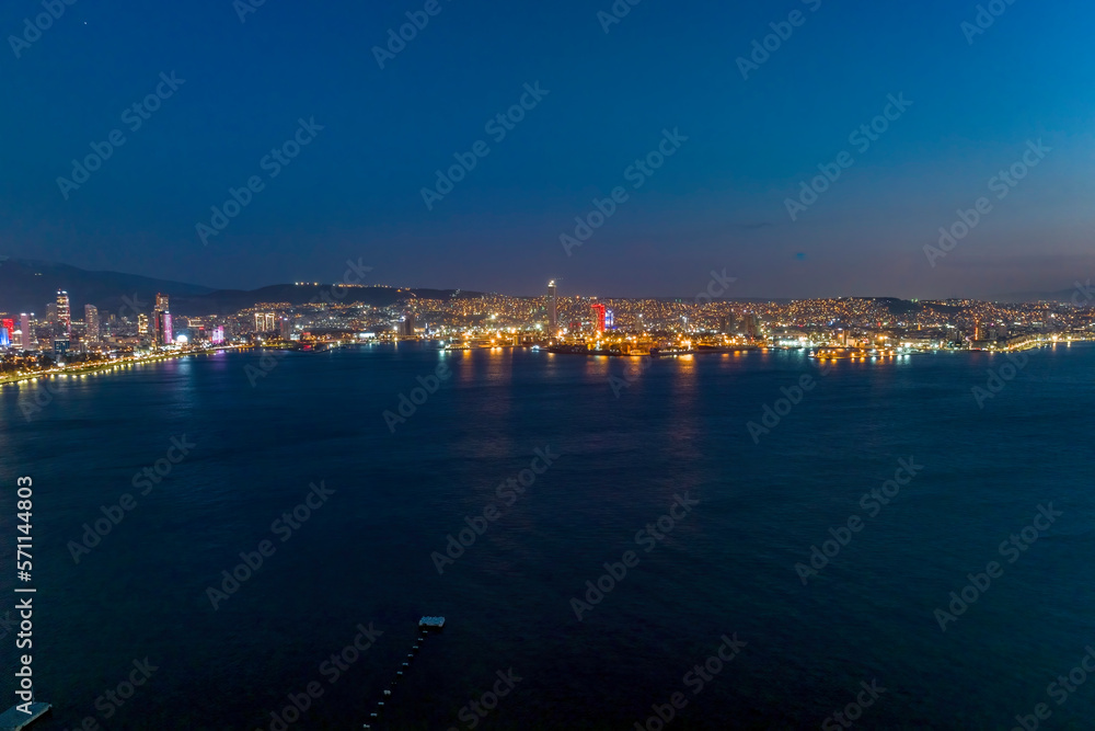 city skyline at night in izmir