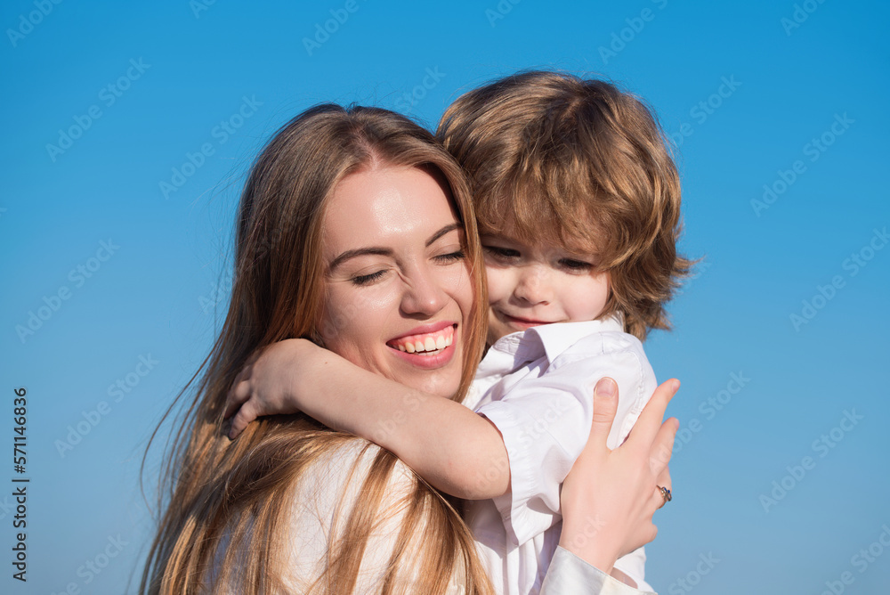 Mother hug. Portrait of mother and child hugging. Mother hugging and embracing son. Mothers day, love family. Mother and child with hugging tenderness. Mothers hugging child, cuddle warm hug. Mother hug. Portrait of mother and child hugging. Mother hugging and embracing son. Mothers day, love family. Mother and child with hugging tenderness. Mothers hugging child, cuddle warm hug.