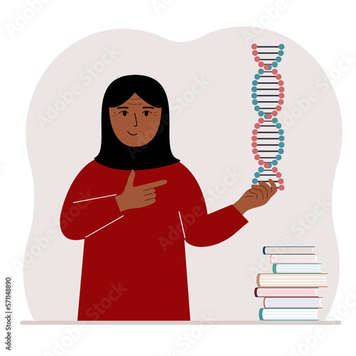 A woman holds a DNA model in his hand and there are many books nearby.
