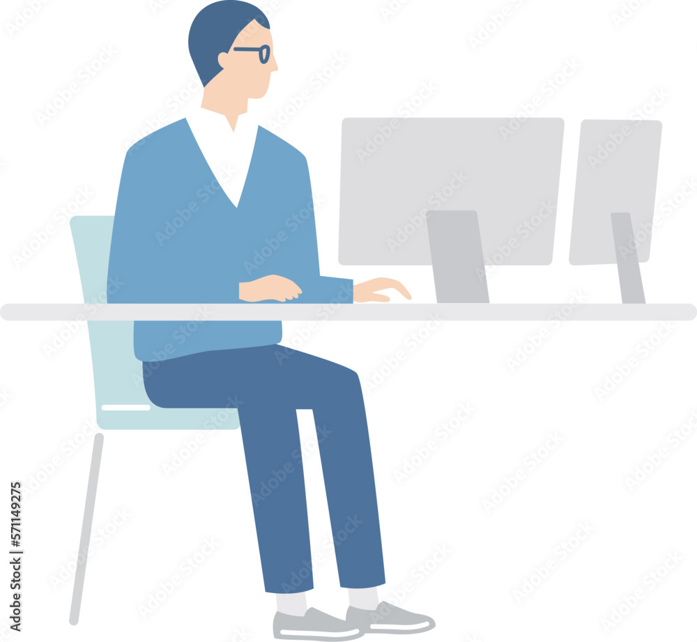 デスクトップパソコンで仕事をするビジネスマン