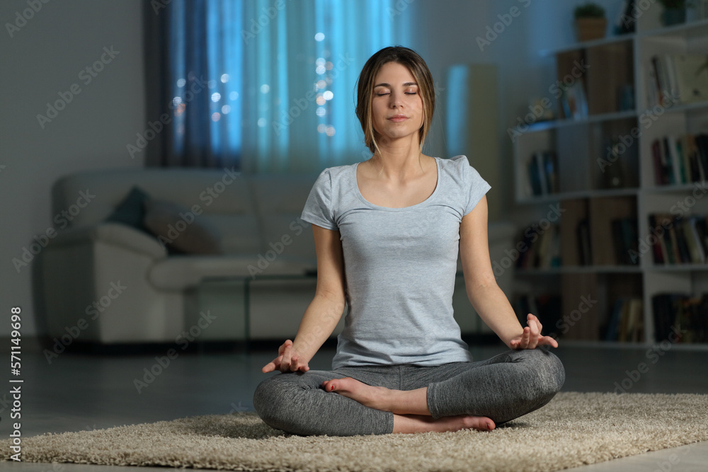 © Antonioguillem - Yogi doing yoga in the night at home © Antonioguillem - Yogi doing yoga in the night at home
