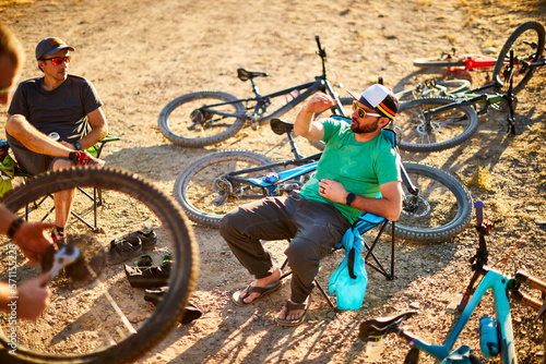Mountain bikers enjoying post ride beers. photo