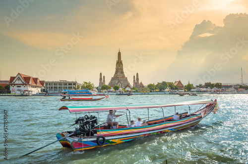 raditional public boat in Chao phraya river sightseeing near wat Arun on beautiful day; Water Transportation Thailand