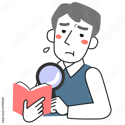 老眼のため虫眼鏡を使って活字を見るシニア男性