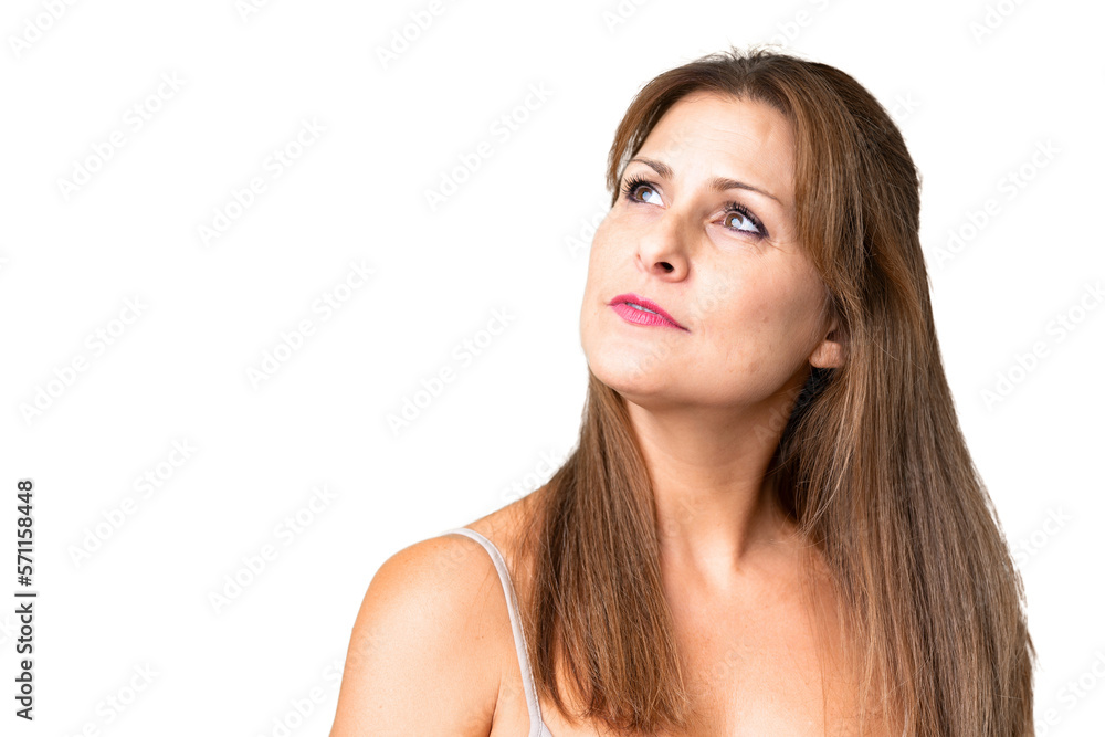 Fototapeta premium Middle age woman over isolated background . Portrait