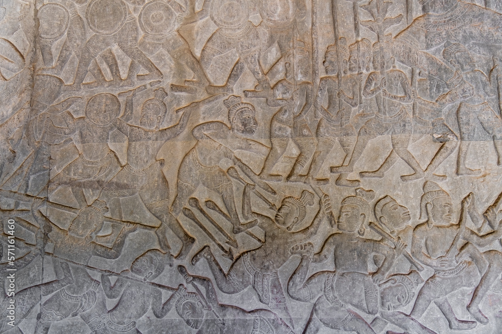 Excellent warriors with a spear's bas-relief or stone carving on the wall of Angkor Wat Temple, Siem Reap, Cambodia