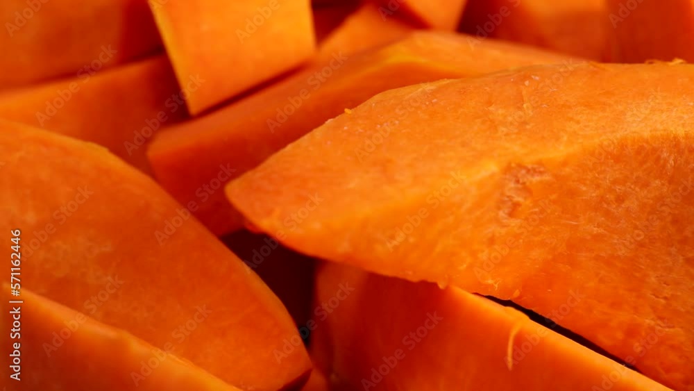 Ripe pumpkin slices rotate, making pumpkin puree or soup Ripe pumpkin slices rotate, making pumpkin puree or soup