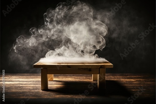 Empty wooden table with smoke float up on dark background,used as a studio background wall to display your products