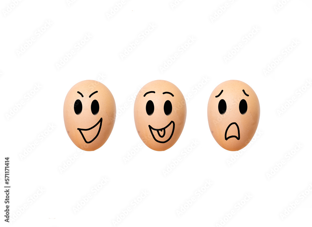 Huevos de gallina frescos naranjas con caritas dibujadas de enfado, alegria, tristeza, mal humor, contento, sonriente Huevos de gallina frescos naranjas con caritas dibujadas de enfado, alegria, tristeza, mal humor, contento, sonriente