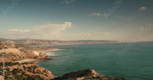 Aerial view on ocean waves and rocks on the Atlantic coast in Morocc photo