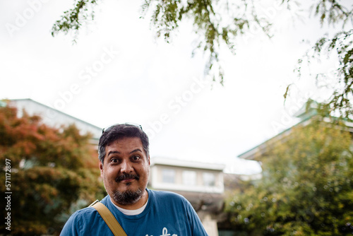 Man in Mid 40's Smiling Outside Cincinnati Zoo photo