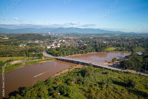 Aerial view of drone flying above Kok River, Chiang Rai Province, Thailand