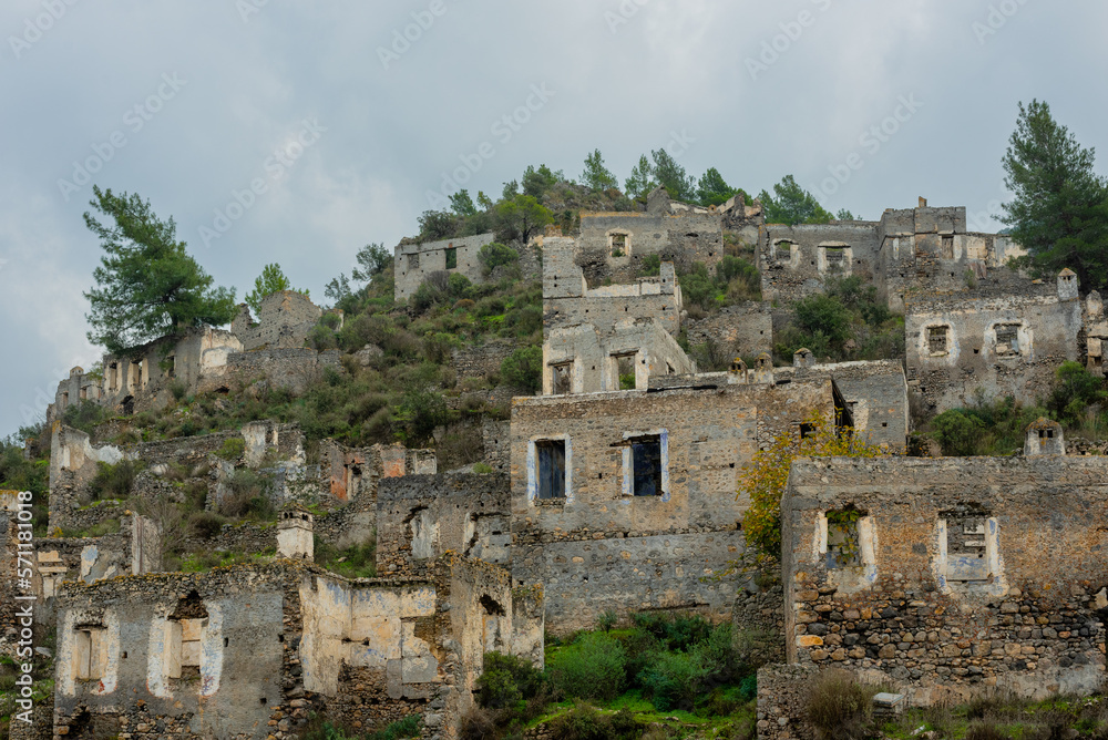 Abandoned Greek village in Turkey. Stone houses and ruins of Fethiye Kayakoy.